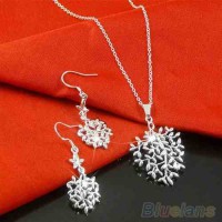 COLLAR Y ARETES ÁRBOL Y FLORES EN PLATA TIBETANA